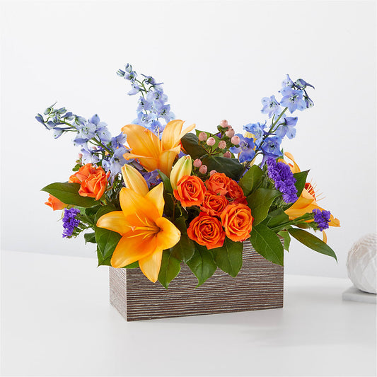 Bouquet radieux de boîtes d'agrumes