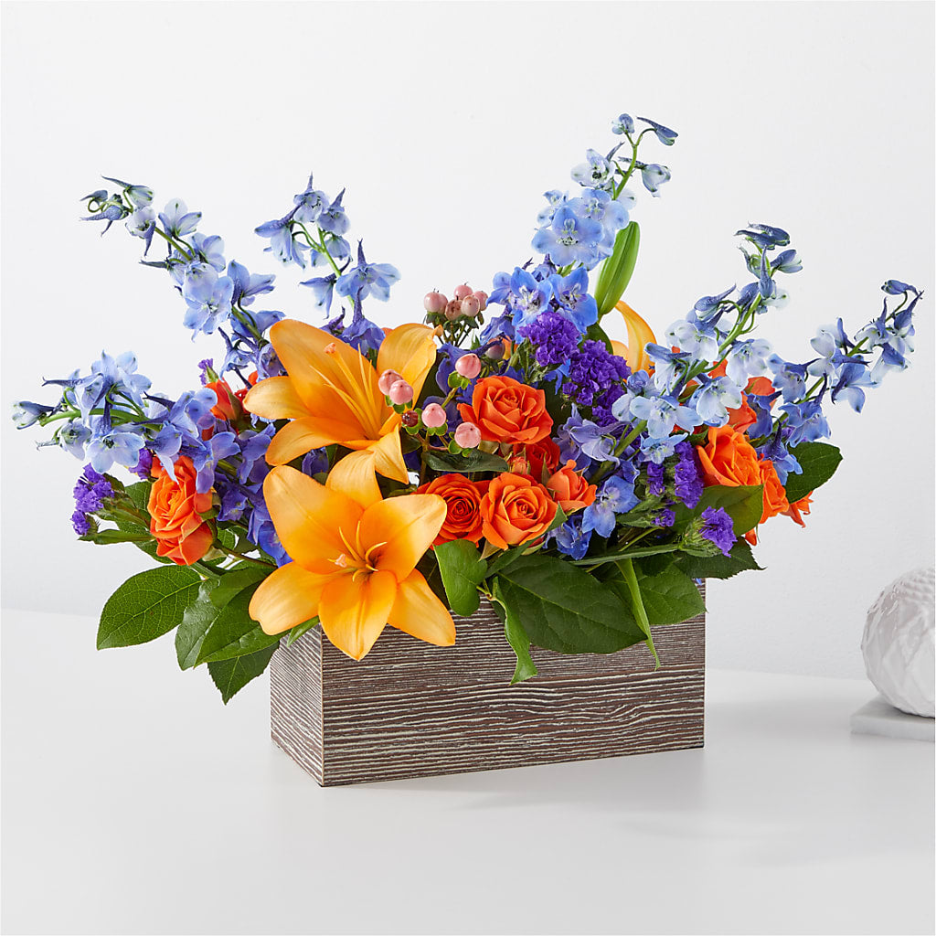 Bouquet radieux de boîtes d'agrumes