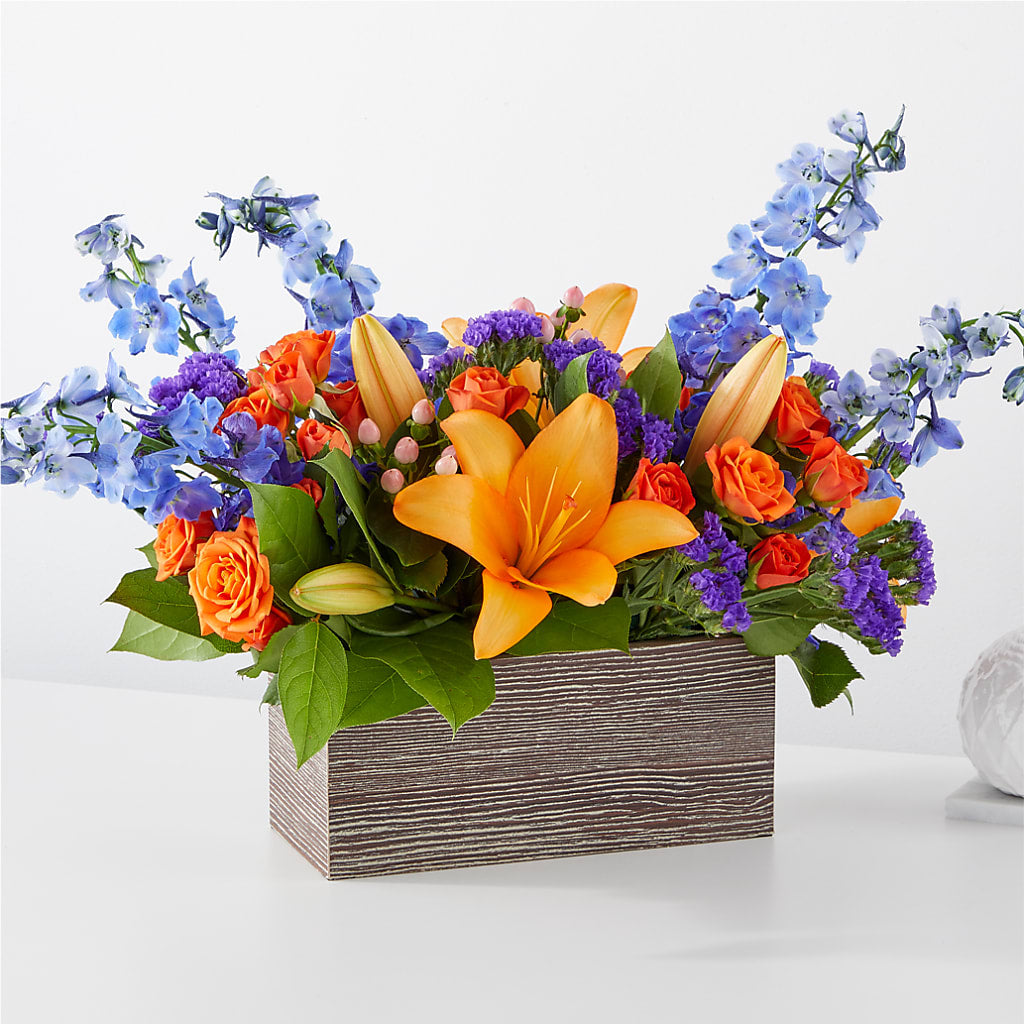 Bouquet radieux de boîtes d'agrumes