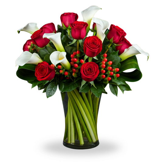 A luxurious vase arrangement featuring red garden roses, white calla lilies, red hypericum berries, and soft ruscus greenery in a clear glass vase, perfect for romantic occasions.